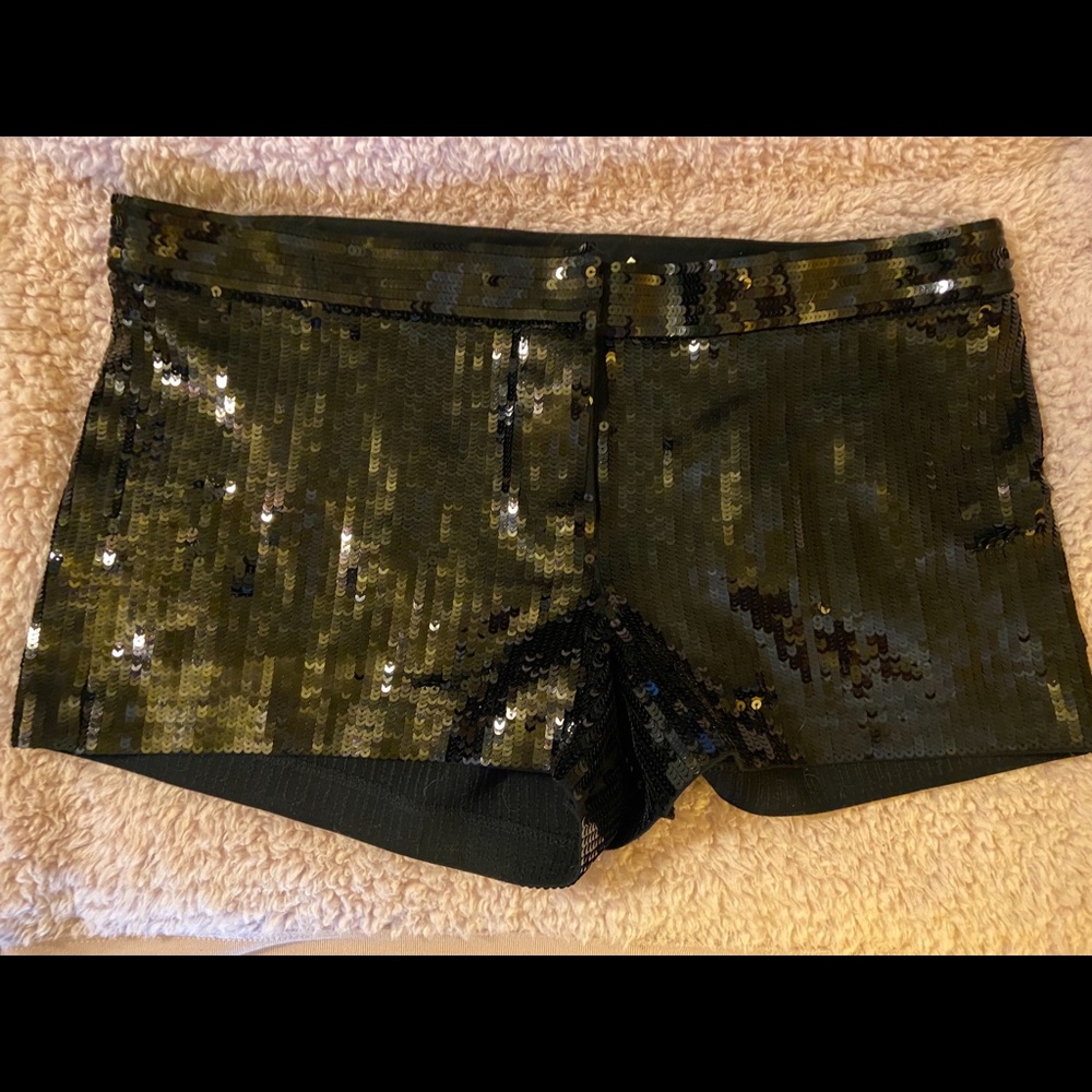 Express black sequin shorts.